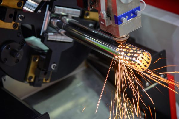 stock-photo-the-cnc-fiber-laser-cutting-machine-cutting-the-stainless-tube-pipe-for-make-holes-1065097730 stock-photo-the-cnc-fiber-laser-cutting-machine-cutting-the-stainless-tube-pipe-for-make-holes-1065097730